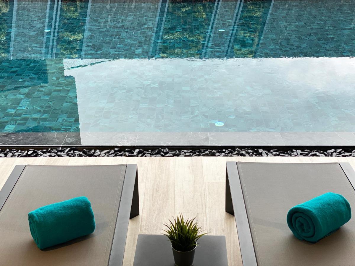 The Oceanic Sportel Phuket - Sha Extra Plus Exterior photo The swimming pool at the hotel